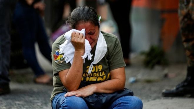 El Salvador Woman Cries From Murders