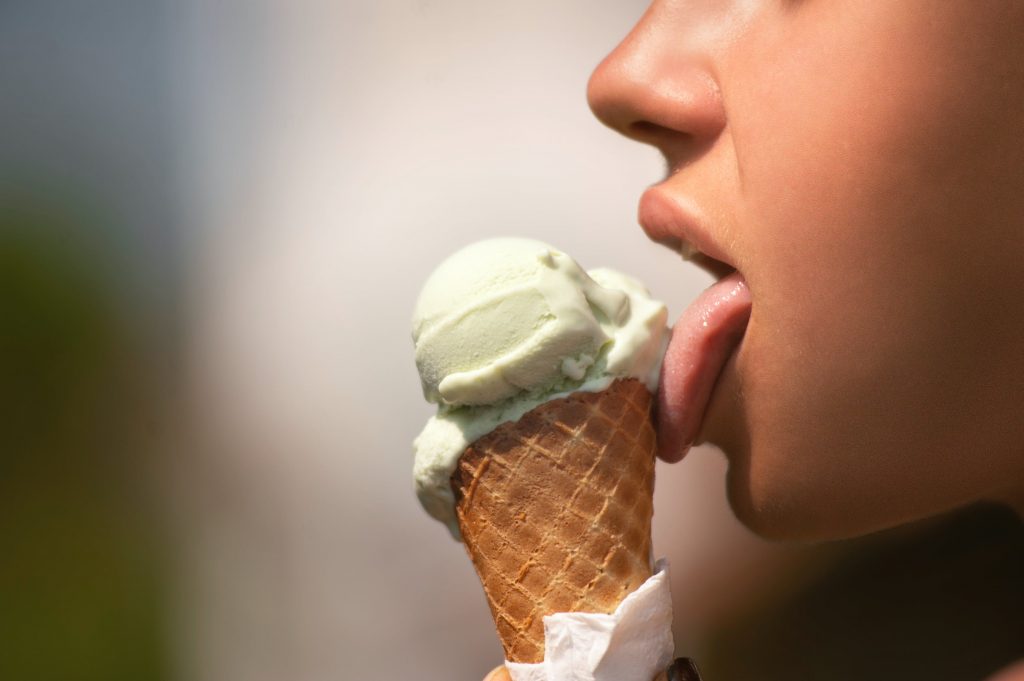 Licking Ice Cream Cone