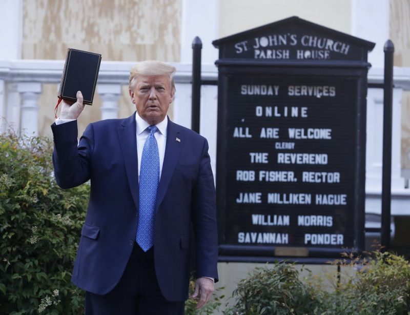 President Trump Holding Bible